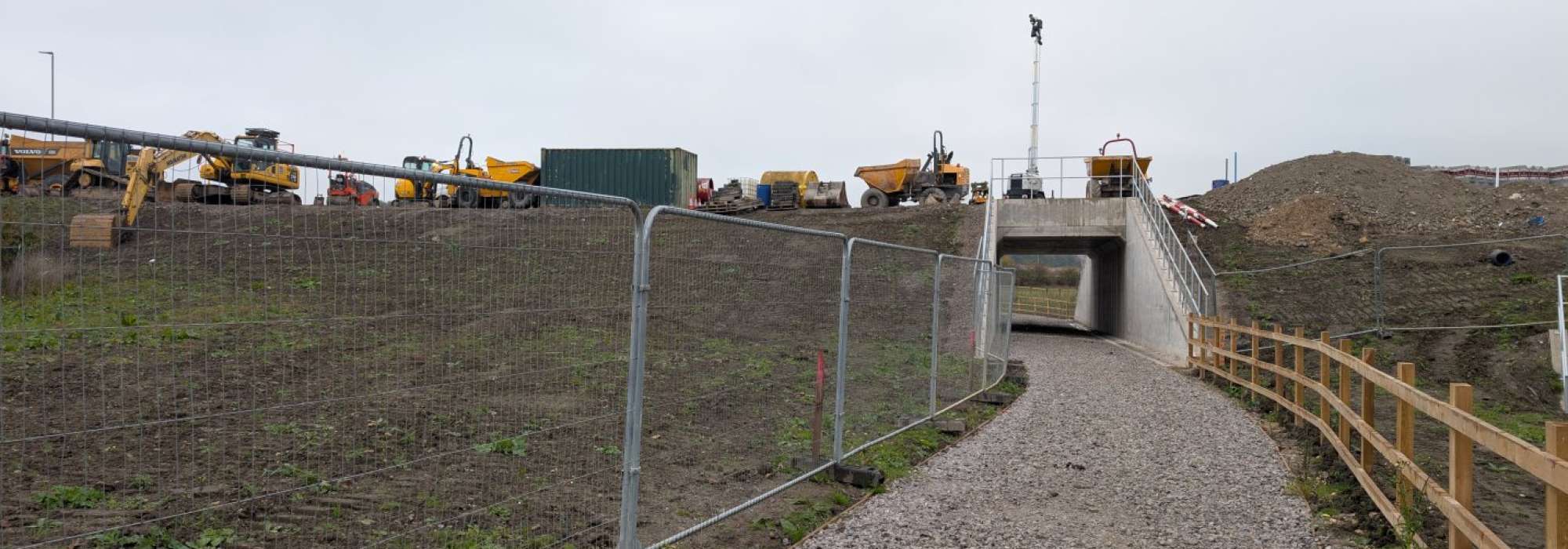Development land with lots on machinery on it. 