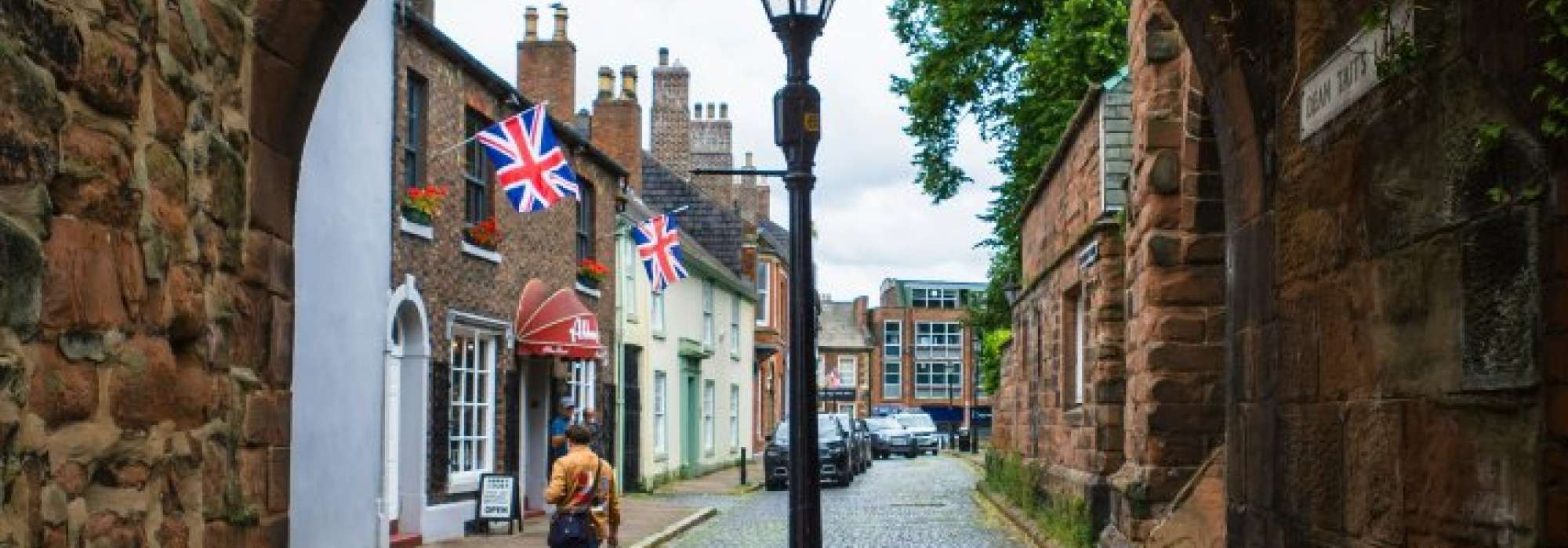 alley with a lamp post at the end