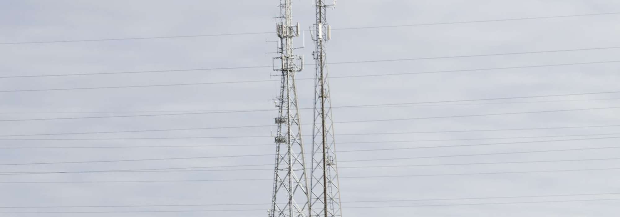 Telephone mast in the middle of a field